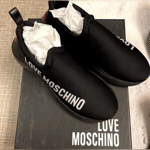 Moschino black shoes.